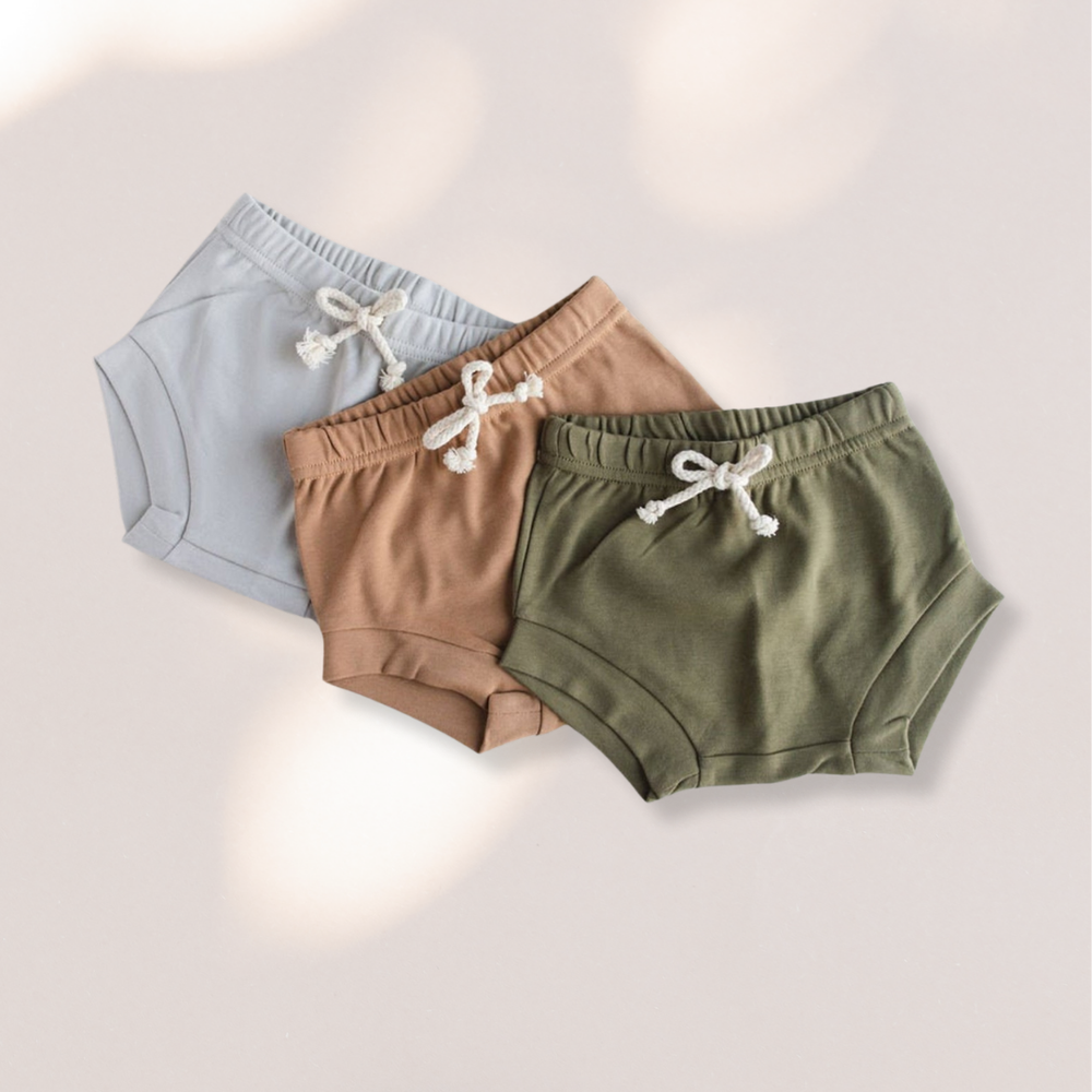 Soft and breathable organic cotton baby shorties, shorts, and bloomers, designed for comfort and style with a gentle touch on delicate skin. Perfect for everyday wear and eco-conscious parents.