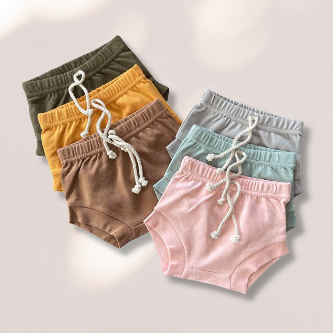 Organic cotton baby shorties, shorts, and bloomers in a soft, breathable fabric, featuring a comfortable and stylish design for delicate skin. Ideal for all-day wear and eco-friendly